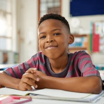 portrait-happy-black-elementary-boy-600nw-2494341955